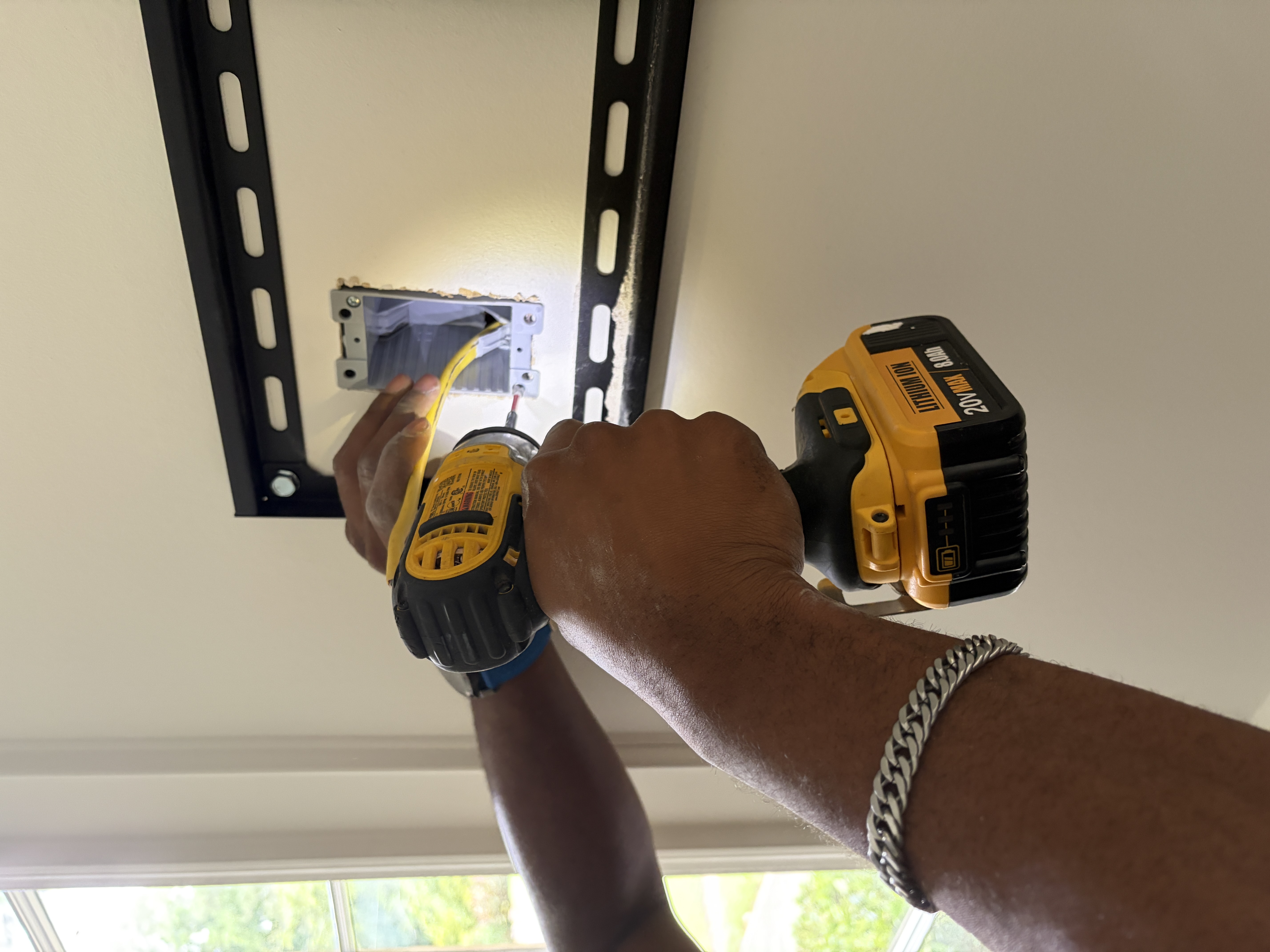 Clean wall with TV cables concealed in-wall for a wire-free look in Alpharetta